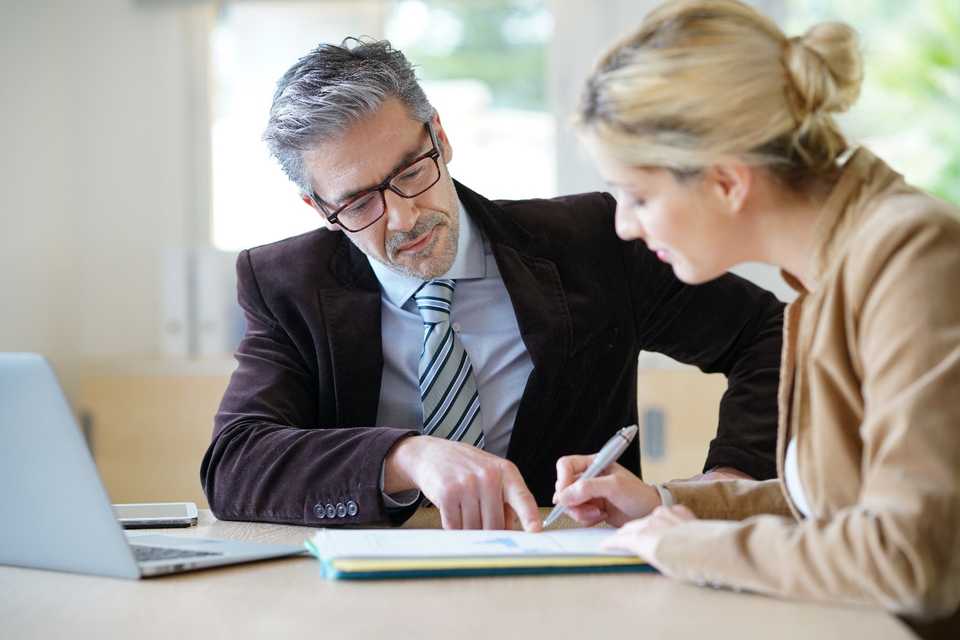 female client meeting with her lawyer