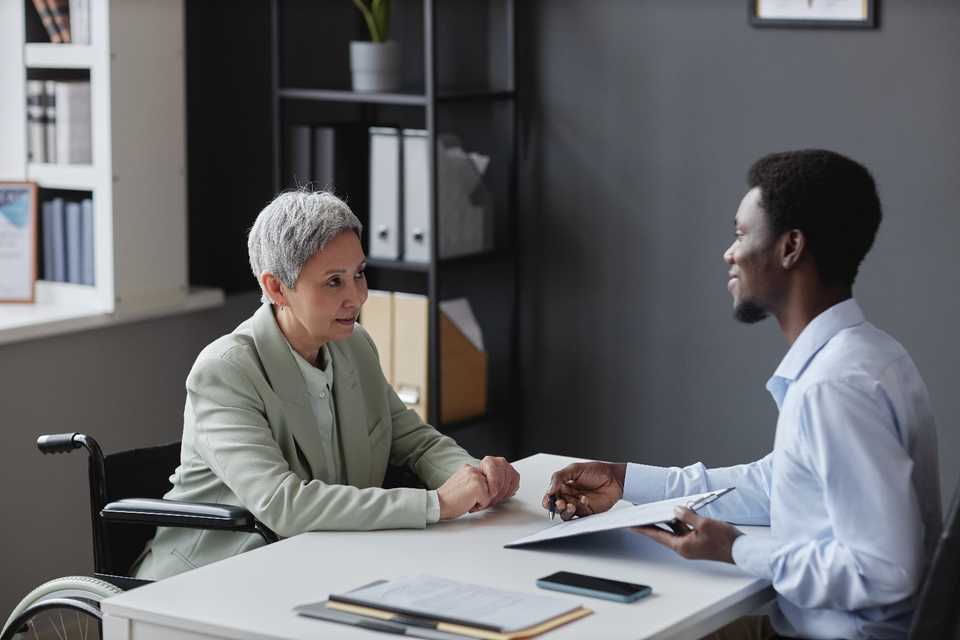 Woman with a disability at a job interview